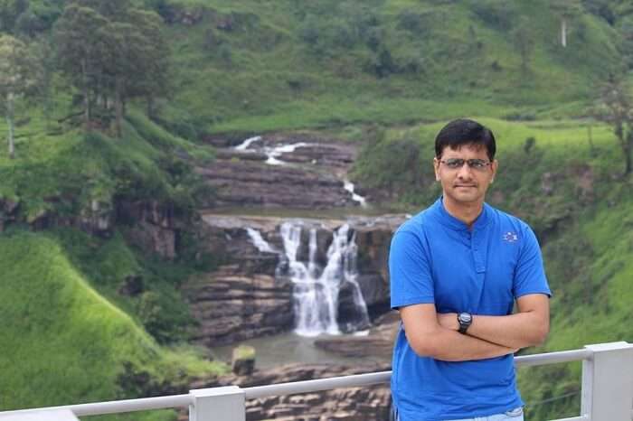 Taking pictures near a small waterfall in Bentota