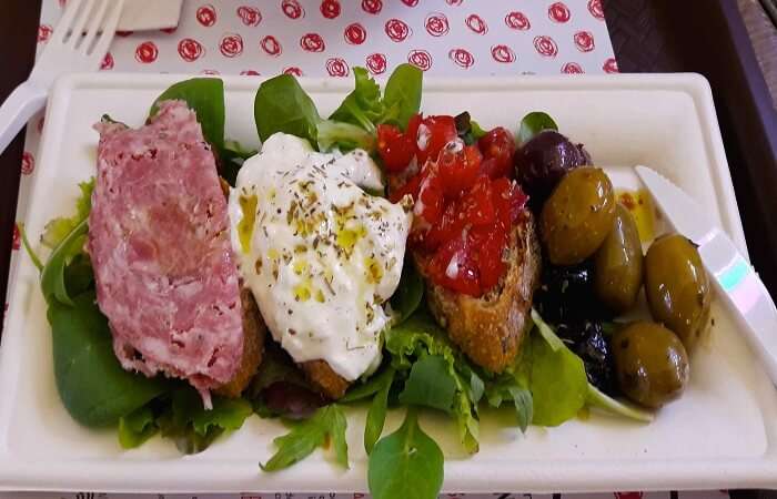 Trying local delicacies