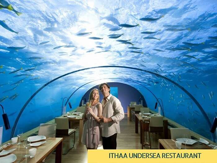 A couple at the undersea Ithaa diner in Maldives