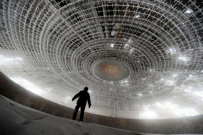 A person looks at the ceiling of the House of the Bulgarian Communist Party in Belgium