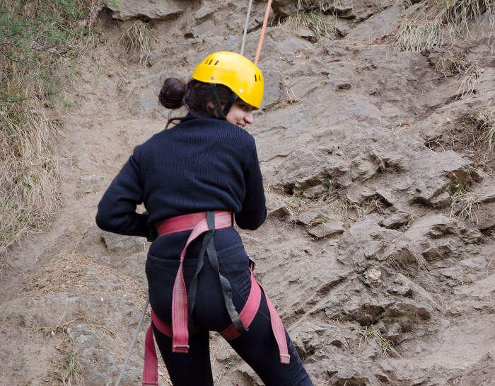 Aanchal doing rock climbing in Kanatal