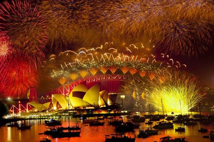 The mesmerising fireworks behind Harbor Bridge in Sydney, one of the best places in the world to celebrate New Year