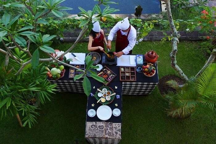 couple cooking session in Furama Villas