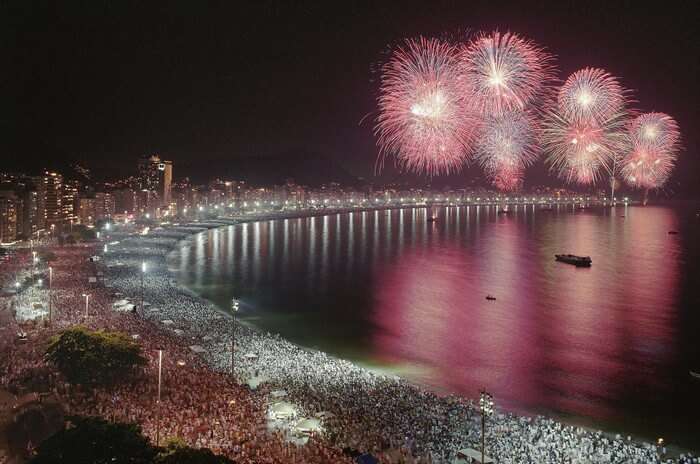 An illuminated beach party in Hawaii, one of the best places in the world to celebrate New Year