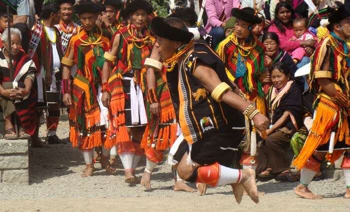 A war dance performer in action during Hornbill Fest in Nagaland