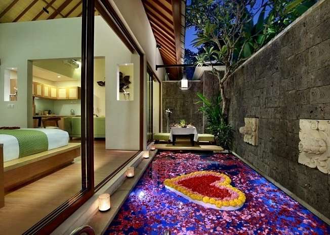honeymoon suite with flower arrangement in ini vie villa