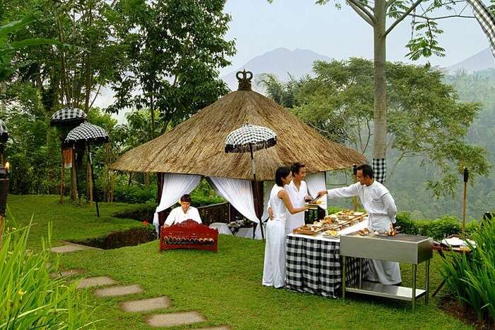 dining area and open buffet arrangement in Kayumanis Ubud Private Villas & Spa