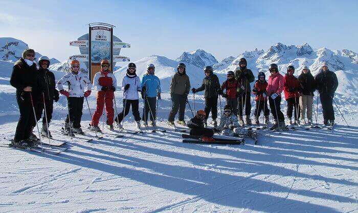 Young skiers wait for their ski trip to begin at the Serre Chevalier ski resort