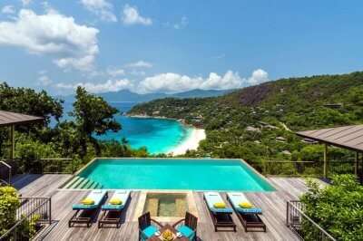 An aerial shot of the infinity pool at the Four Seasons Resort in Seychelles