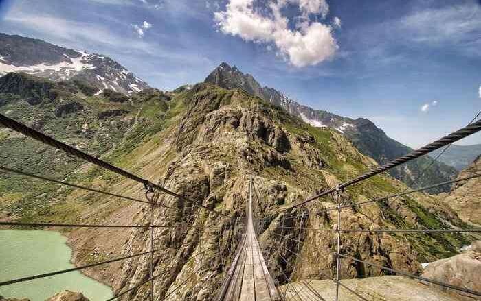 The swingy Trift Bridge in Swiss Alps