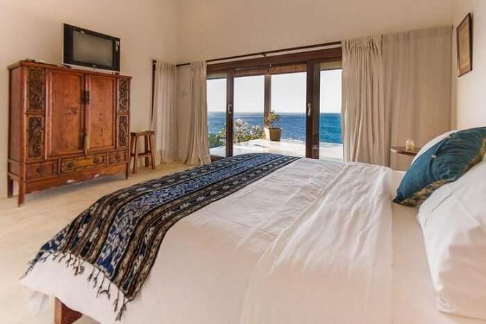 fully furnished bedroom with private pool in villa sarchi