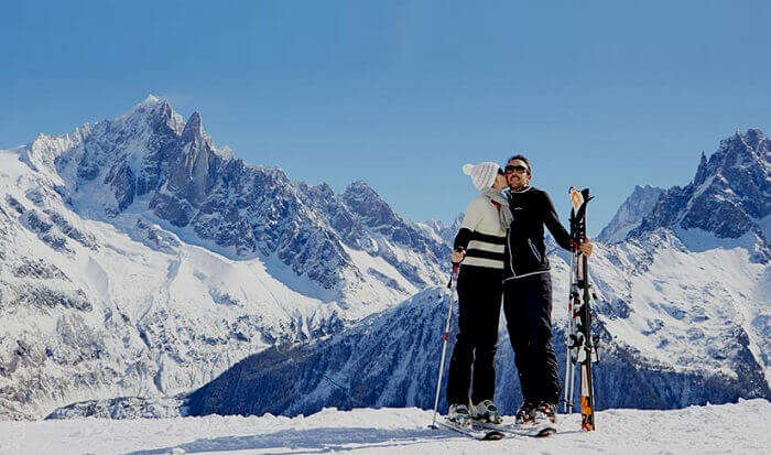 A couple enjoys their visit to the Chamonix ski resort