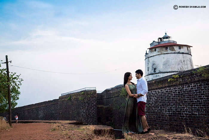A couple romancing in privacy at Aguada Fort in Goa