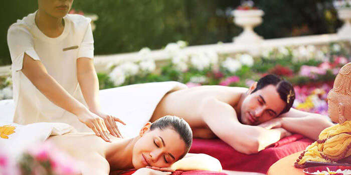 A couple indulging in Couple’s Spa Treatment at Ananda Spa Resort