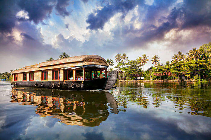 A houseboat sailing on the backwaters of Alleppey