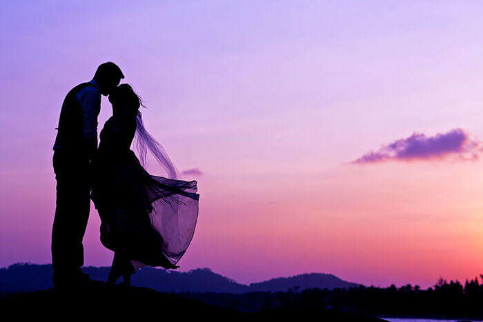 A couple hanging out on the hilltop in Ooty