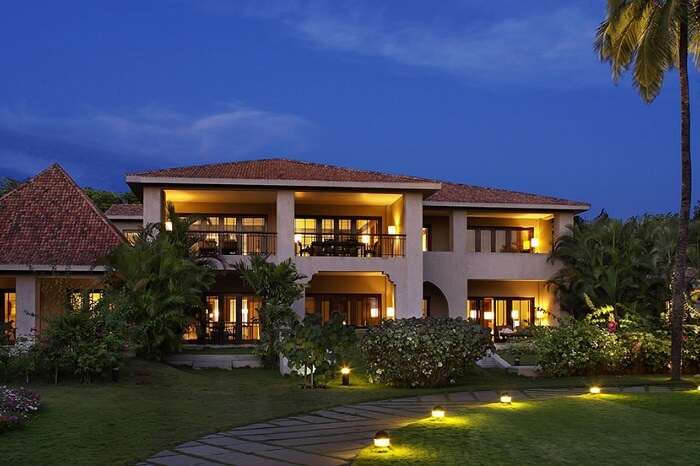 A night shot of the lawn and hotel building at Leela Goa in Cavelossim