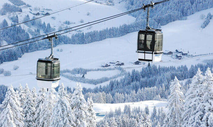 People travel in cable cars at the Megeve Ski Resort