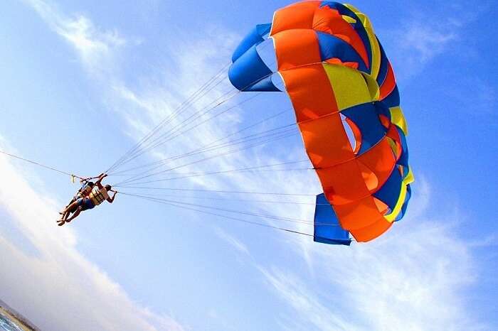 A couple tries parasailing in Goa