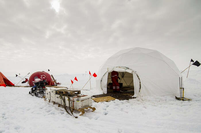 Polar research dive camp over a drifting ice floe in Antarctica