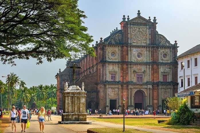 Unidentified tourists visit to the famous landmark - Basilica of Bom Jesus (Borea Jezuchi Bajilika) in Old Goa