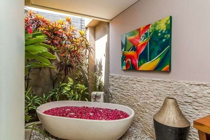 bathroom with bathtub in villa essence