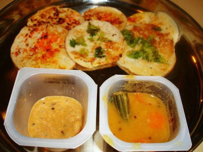 Kerala's famous thick Thattu Dosa with spicy chutney and Sambar