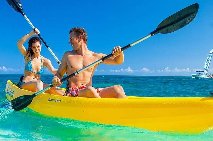 kw-030617-A couple kayaking in the saffire blue waters on their Caribbean honeymoon