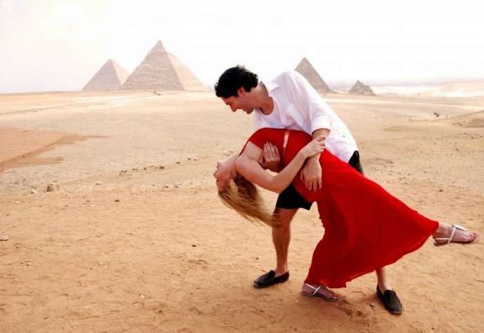 Couple in front of the Pyramids in Egypt