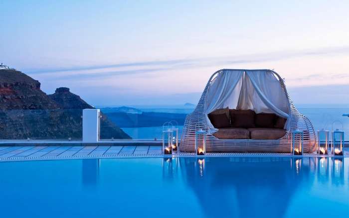 Dive between the two skies with your love at Santorini island Greece