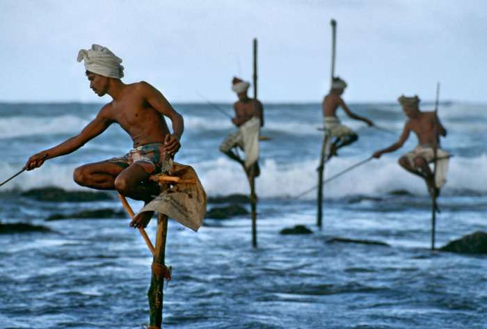 Traditional stilt fishing on the stilts 2 meters above the sea