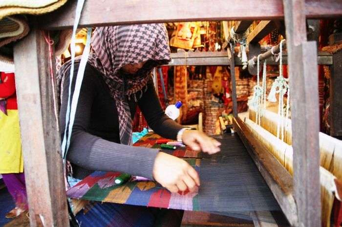 Hand made Pashmina on the loom by a textile worker