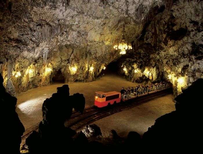 Explore the underground caves in Slovenia