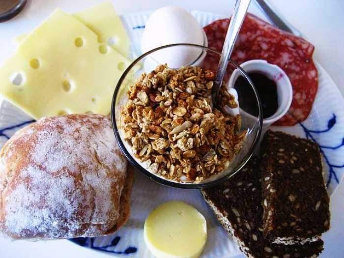 Rye bread, salami, honey, jam, and pate make for perfect breakfast in Denmark