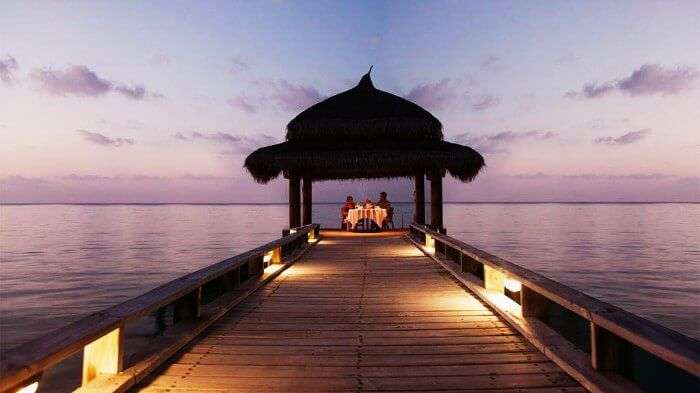 Couple dining in Maldives