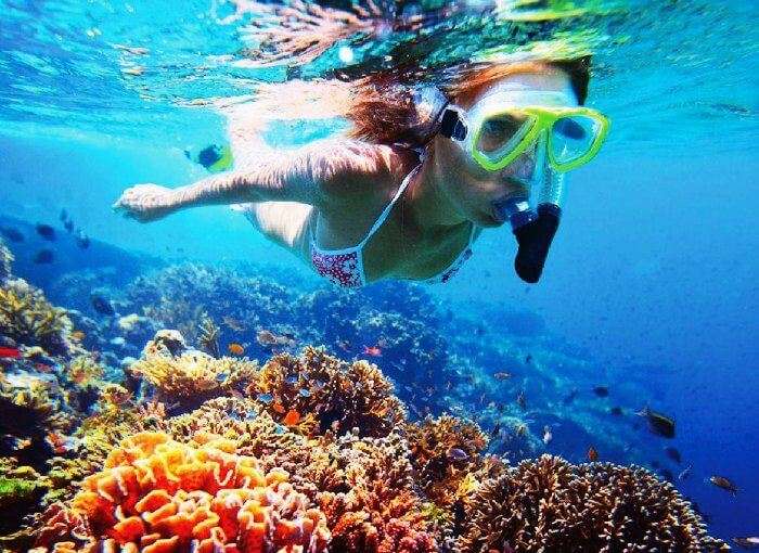 A girl snorkeling in Thailand
