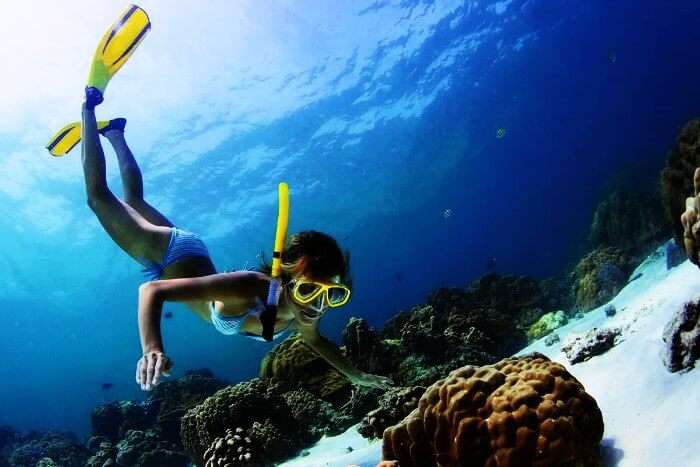 Snorkeling in Maldives in the azure blue waters is an amazing experience