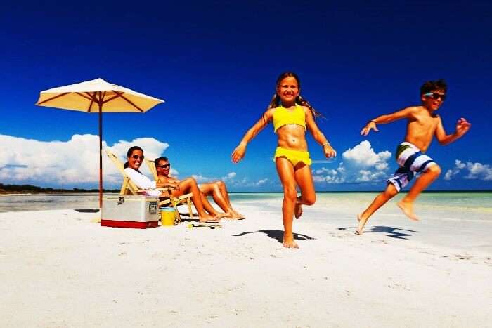 Family having fun in Sri Lankan beach