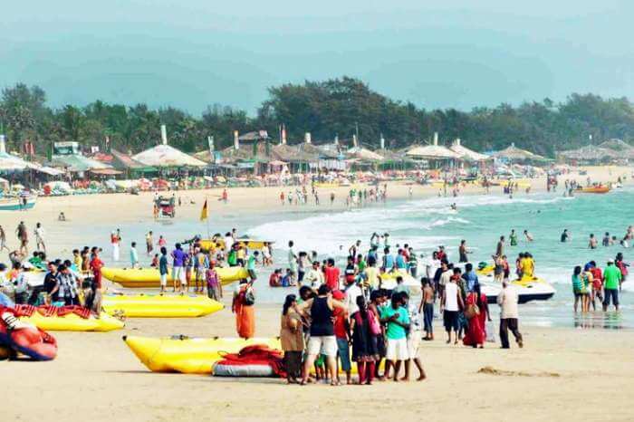 Indulge in a banana boat ride on one of the best places to visit in Goa - Baga Beach