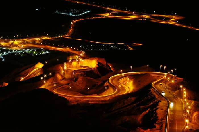 The well-lit road of Drive Jebel Hafeet, UAE