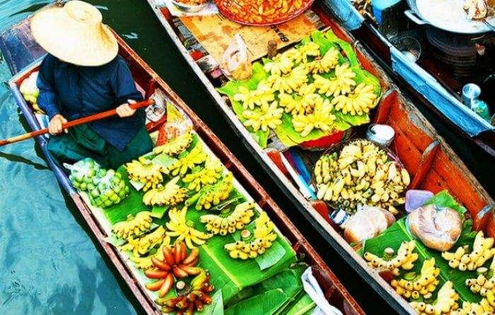 One of the best places to see in Thailand are the colorful floating markets