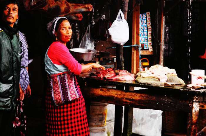 A Khasi Woman working as a butcher