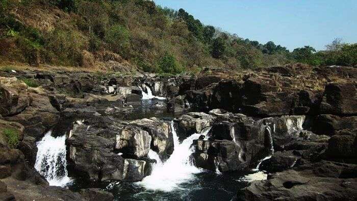 The beautiful Perunthenaruvi Waterfalls in Kerala