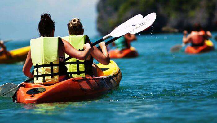 Sea kayaking in blue waters of Mauritius