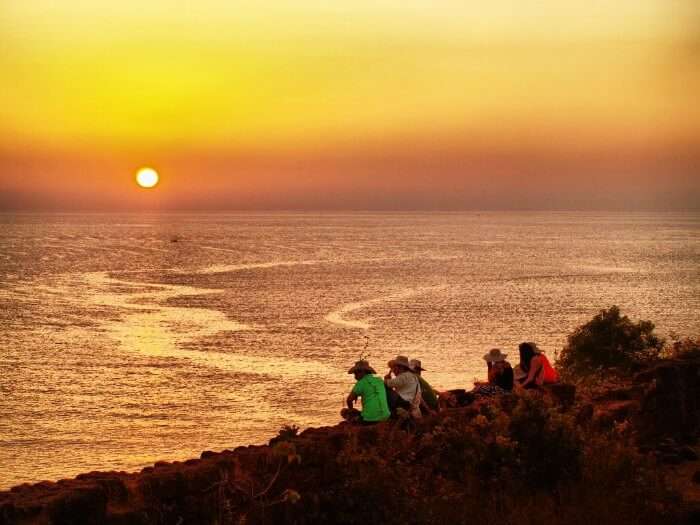 People hanging out at Chapora fort in Vagator beach