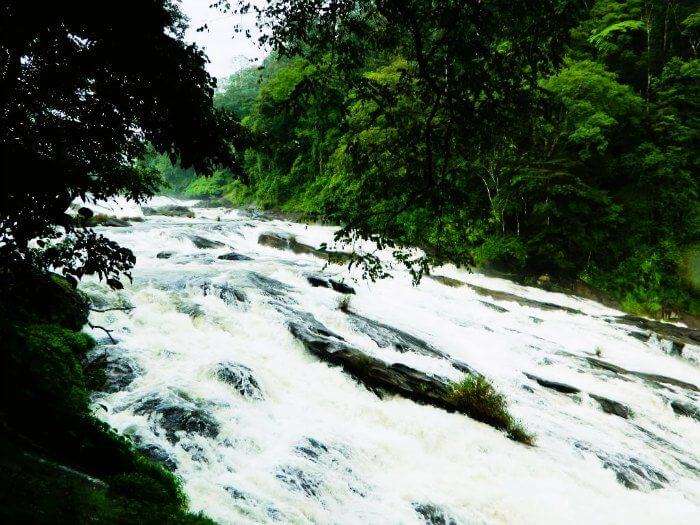 Water streaming down the beautiful falls of Vazhachaal in Kerala