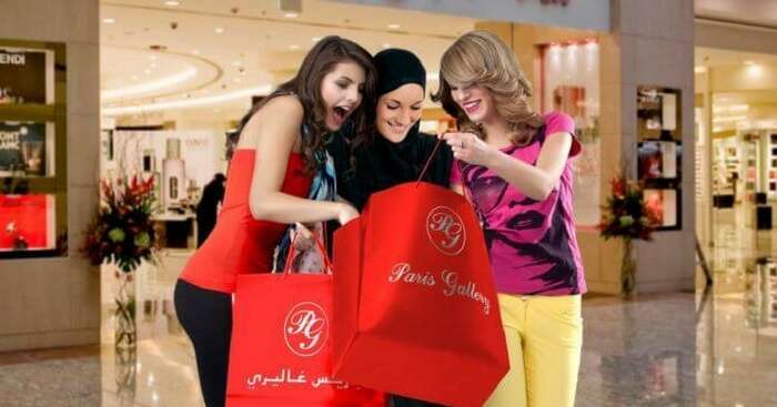 3 young girls enjoying shopping at a mart in Dubai