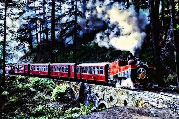 Kalka-Shimla toy train passing through the mountains