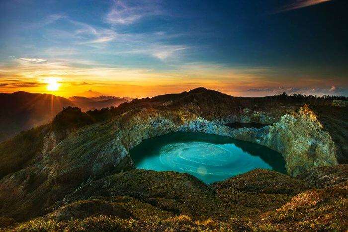 A sunset view of the three-colored Kelimutu Lake in Indonesia