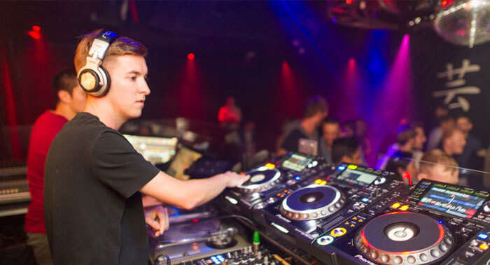 A DJ playing at the Geisha Bar